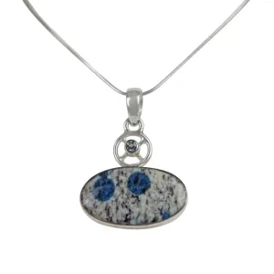 A charming Oval Shaped K2 Jasper Pendant Accent with a Tiny Blue Topaz on a Wagon Wheel
