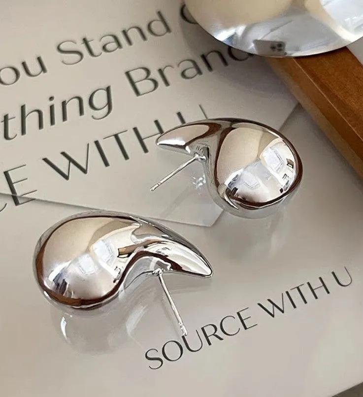 Sense of luxury niche hollow drop earrings personality temperament earrings dopamine stud earrings jewelry wholesale women