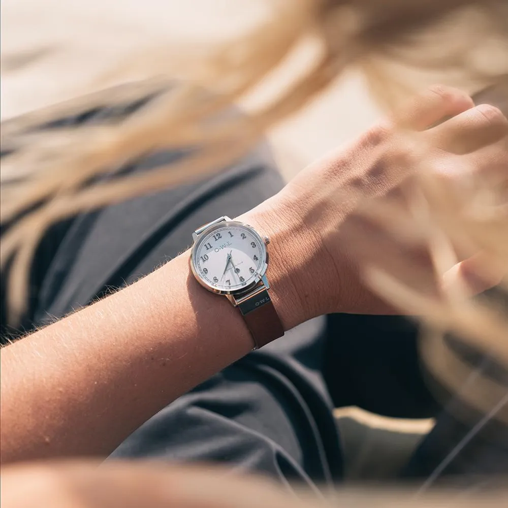SUTTON LADIES ANALOGUE WATCH WITH WHITE DIAL ON A POLSIHED SILVER CASE & TAN LEATHER STRAP